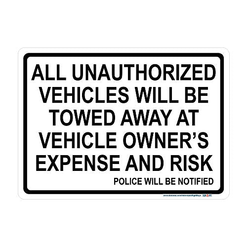 All Unauthorized Vehicles Will Be Towed Sign